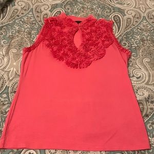 Beautiful oral color flower design sleeveless blouse.